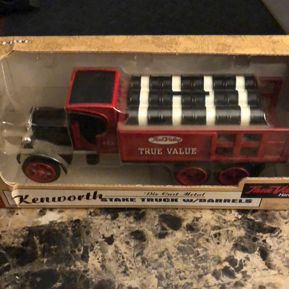 1925 Kenworth stake truck w/ barrels